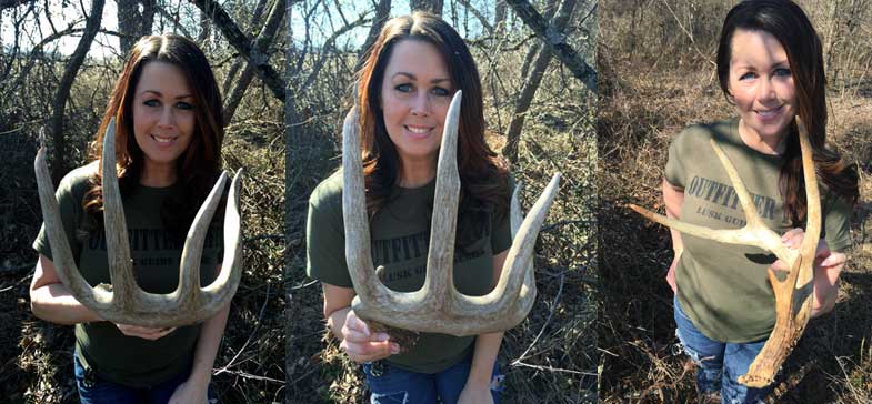 Man holding shed deer antlers